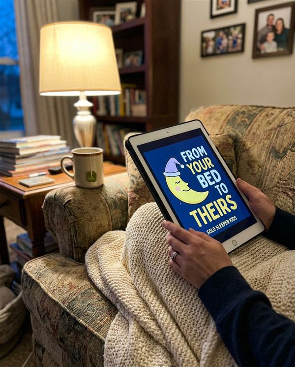 Mom holding a tablet showing the Daltik Sleeper Kids book